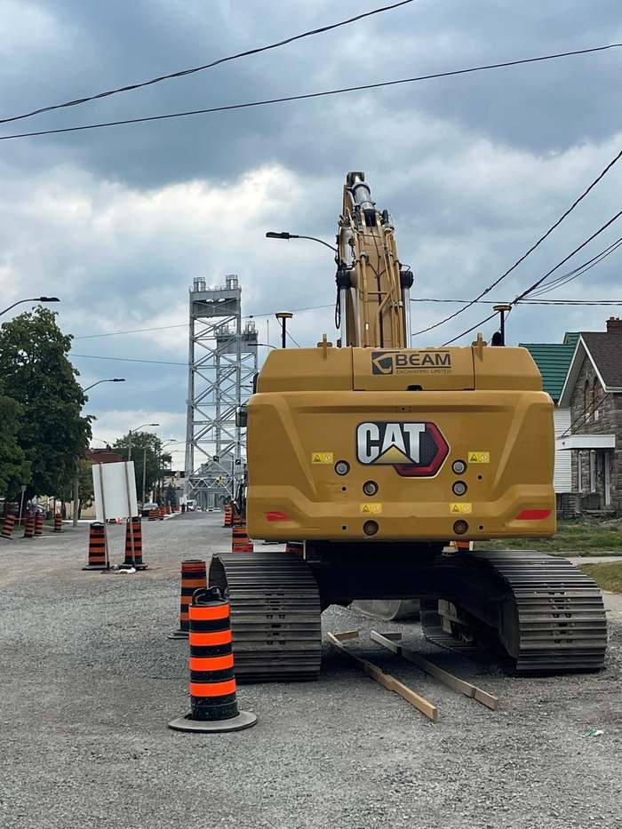 Excavator working on a Welland road reconstruction project